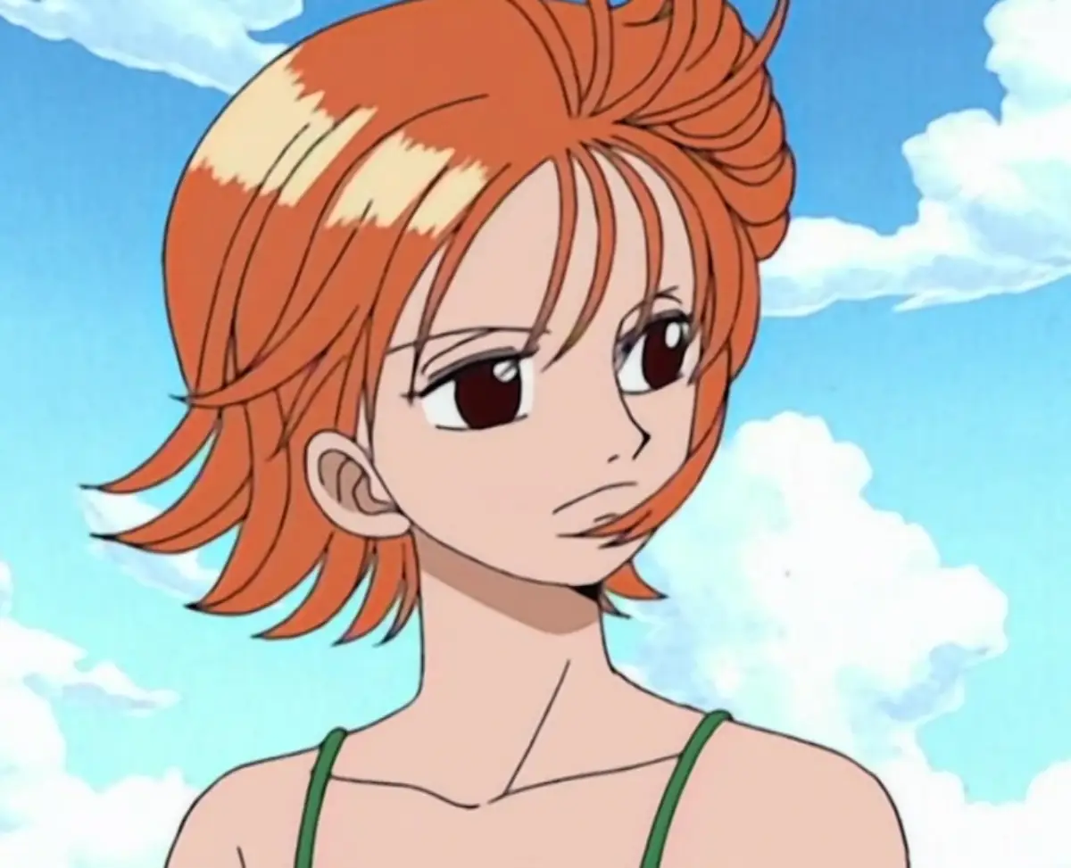 Nami from One Piece showing contemplative sad expression reflecting on her traumatic past with Arlong Pirates