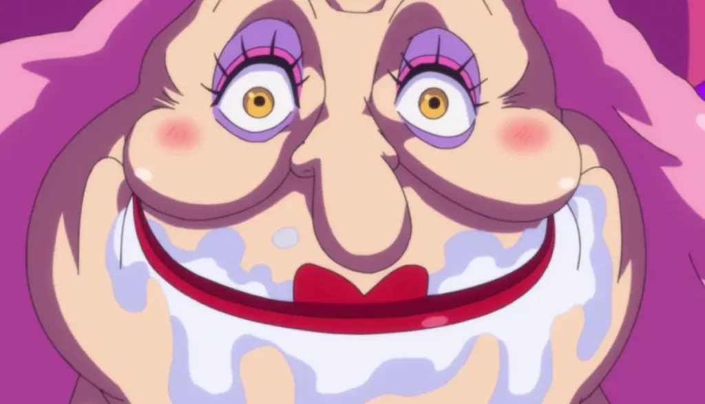 Close-up of Big Mom’s wide-eyed, unsettling face with cream around her mouth, One Piece anime.