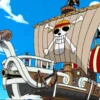 Going Merry ship sailing under clear skies with the Straw Hat Pirates’ jolly roger on its sail, One Piece.