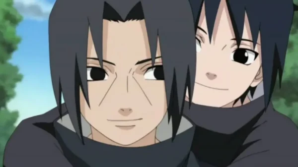 Sasuke smiling while riding on Itachi’s back, showing their bond before the Uchiha massacre.