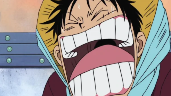 Monkey D. Luffy screaming with exaggerated emotion, his mouth wide open and tears forming — a classic over-the-top reaction from One Piece blending comedy and desperation.