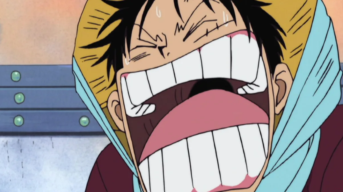 Monkey D. Luffy screaming with exaggerated emotion, his mouth wide open and tears forming — a classic over-the-top reaction from One Piece blending comedy and desperation.